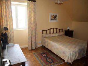 Ένα ή περισσότερα κρεβάτια σε δωμάτιο στο Gîte de France La deymie 3 épis - Gîte de France 6 personnes MAE-6404 +21 φωτογραφίες