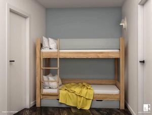 a bunk bed room with two bunk beds at Résidence La Rivière - maeva Home - Appartement 2 pièces 6 personnes - Sé 71 in Chamonix