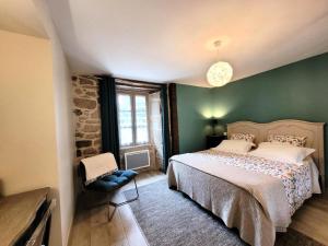 Ένα ή περισσότερα κρεβάτια σε δωμάτιο στο Gîte de France Les 7 sources 3 épis - Gîte de France 4 personnes MAE-9154