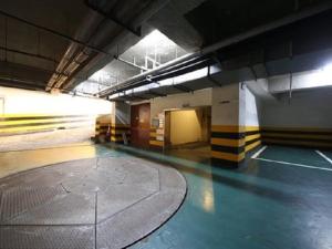 an empty parking garage with a basketball court in it at Halla guest house in Jeju