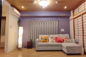 Posezení v ubytování Nagoya Apartment Oosu