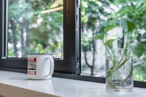 Afbeelding uit fotogalerij van Shanghai Hills&XING 1885 Family Homestay Near Line2 & Line12 West Nanjing Road in Shanghai +14 foto's