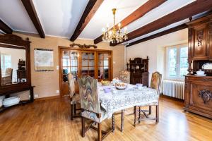 Posezení v ubytování Gîte de France Le cantou des mille sources 3 épis - Gîte de France 8 personnes MAE-0234