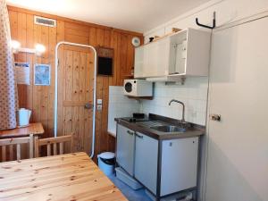 Kuchyň nebo kuchyňský kout v ubytování Résidence Nova - Studio 3 personnes, proche des pistes et des commerces, au cœur de la station d’Arc 1800 dans le village des Villards MAE-1852