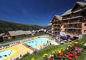 A view of the pool at Résidence Le Thabor - maeva Home - Appartement 2 Pièces 4 Personnes - Confo 34 or nearby