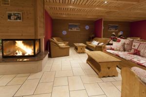 Istumisnurk majutusasutuses Etoile des Neiges Hôtel et Piscine