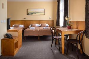 Postel nebo postele na pokoji v ubytování Anyday Apartments