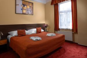 Postel nebo postele na pokoji v ubytování Anyday Apartments