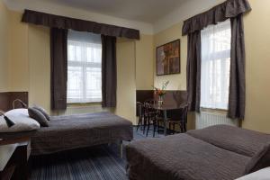 Postel nebo postele na pokoji v ubytování Anyday Apartments