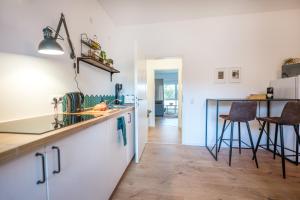 Kuchyň nebo kuchyňský kout v ubytování Koblenz' Größte, 5 SZ, HBF, ideal für Gruppen & Firmen