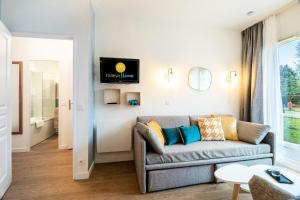 Część wypoczynkowa w obiekcie Résidence Les Rives de L'Aure - maeva Home - Appartement 2 pièces 5 personnes - Sélection MAE-6737