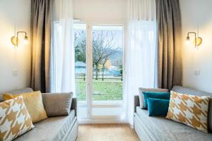 Część wypoczynkowa w obiekcie Résidence Les Rives de L'Aure - maeva Home - Appartement 2 pièces 5 personnes - Sélection MAE-6737