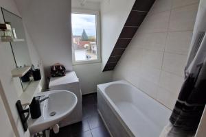 A bathroom at Appartement Strasbourg