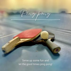 a ping pong paddle sitting on top of a table at Baguio BELL Staycation in Baguio