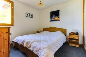 Posteľ alebo postele v izbe v ubytovaní Résidence Presles - Appartement duplex de charme 4 pièces 8 personnes à Vallandry dans un quartier calme et proche des pistes MAE-2004