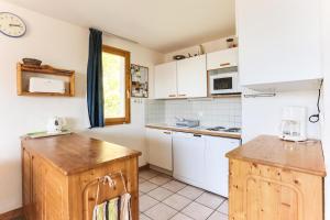 Kuchyňa alebo kuchynka v ubytovaní Résidence Presles - Appartement duplex de charme 4 pièces 8 personnes à Vallandry dans un quartier calme et proche des pistes MAE-2004