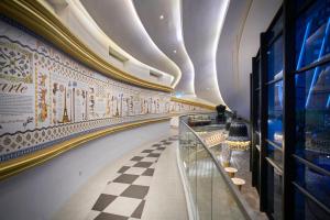 a hallway of a building with a checkered floor at Arte Mont Kiara Free Parking, Kuala Lumpur in Kuala Lumpur