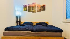 Ένα ή περισσότερα κρεβάτια σε δωμάτιο στο Die Arche - eigene Haushälfte im Stadtzentrum