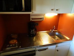 Kuchyňa alebo kuchynka v ubytovaní Résidence Michailles - Studio pour 4 Personnes 08