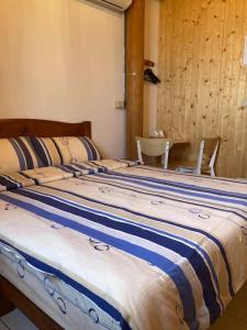 Postel nebo postele na pokoji v ubytování Machigo