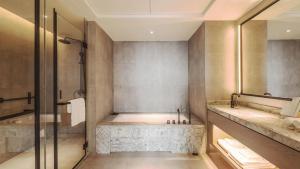 Un baño de Mustel Hotel Knowledge City Guangzhou