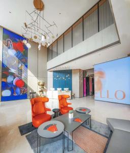 Un lugar para sentarse en Mustel Hotel Knowledge City Guangzhou