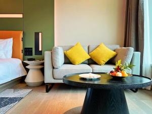Un lugar para sentarse en Mustel Hotel Knowledge City Guangzhou