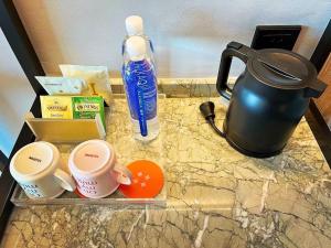 Tetera y cafetera en Mustel Hotel Knowledge City Guangzhou