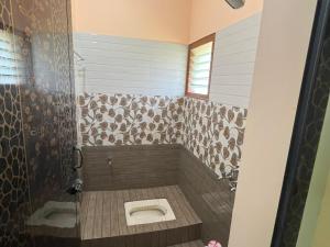 Koupelna v ubytování Sai Ayush Homestay