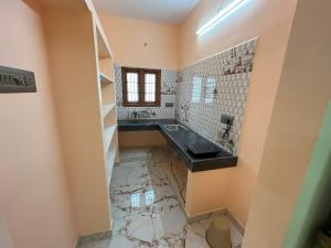 Kuchyň nebo kuchyňský kout v ubytování Sai Ayush Homestay + 37 fotografií
