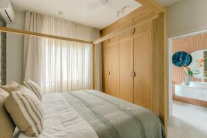 Letto o letti in una camera di Tamarin Sunset Beach II