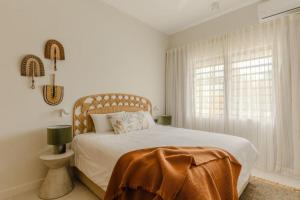 Letto o letti in una camera di Tamarin Sunset Beach II