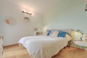 Ein Bett oder Betten in einem Zimmer der Unterkunft El paraíso de Cadaqués IMMO365