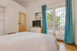 Ein Bett oder Betten in einem Zimmer der Unterkunft El paraíso de Cadaqués IMMO365