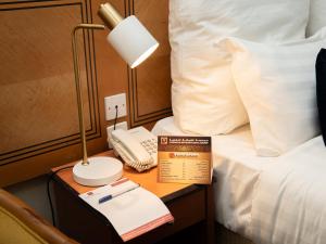 Voodi või voodid majutusasutuse Riyadh Al Deafah Hotel toas