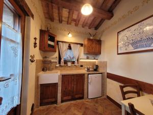 A kitchen or kitchenette at Agriturismo Fiorano