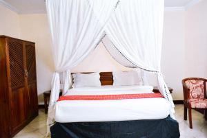Een bed of bedden in een kamer bij 3 Degrees Hotel