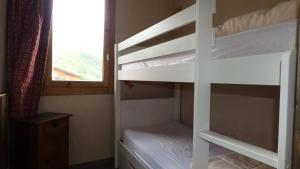 Un ou plusieurs lits superposés dans un hébergement de l'établissement Résidence LAUZIERE DESSOUS - 2 Pièces pour 5 Personnes 04