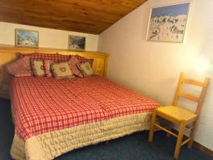 Ένα ή περισσότερα κρεβάτια σε δωμάτιο στο Résidence Portail - Le Portail 64 - 3 pièces au pied des pistes, classé 3 étoiles MAE-5024