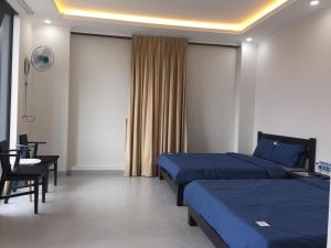 Postel nebo postele na pokoji v ubytování BING BONG HOTEL