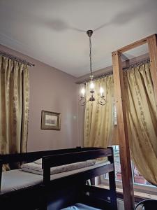 a bedroom with a bed and a window at Green Hostel Wrocław przy ZOO in Wrocław