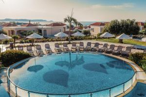 an image of a swimming pool at a resort at Lindos Imperial Resort & Spa in Kiotari