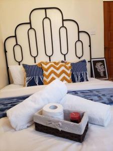 Llit o llits en una habitació de Cozy apartment-Java Blue Embu