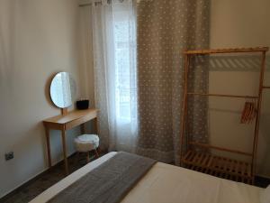 Posteľ alebo postele v izbe v ubytovaní Corfu Town SUNSHINE Apartment