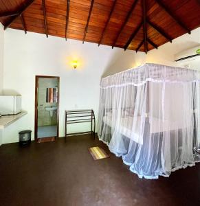 Postel nebo postele na pokoji v ubytování Dinuri villa