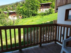 a view from the deck of a cabin at Résidence LUMI BATIMENT B - Appartement LUMI B pour 4 Personnes 754 in Valmorel