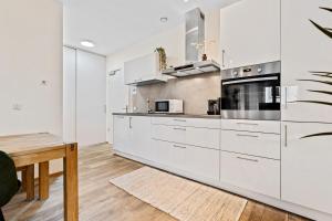 Kuchyň nebo kuchyňský kout v ubytování Elegant 1BR - Limpertsberg Gem
