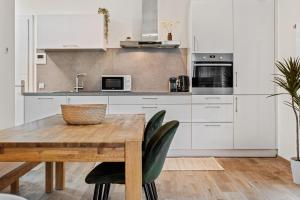 Kuchyň nebo kuchyňský kout v ubytování Elegant 1BR - Limpertsberg Gem