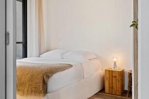 Postel nebo postele na pokoji v ubytování Elegant 1BR - Limpertsberg Gem
