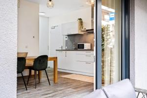 Kuchyň nebo kuchyňský kout v ubytování Elegant 1BR - Limpertsberg Gem